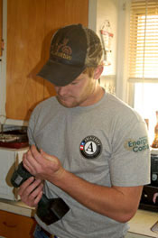 Energy Corps member with drill