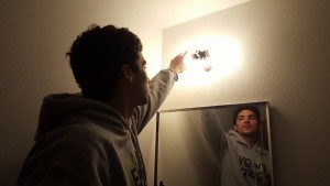 Chris installing CFL bulbs